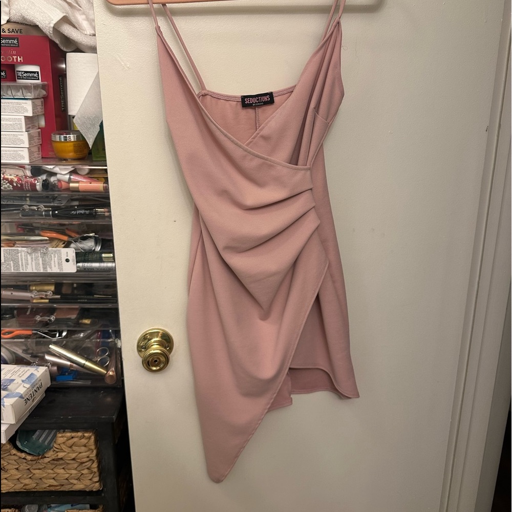 Asymmetric mini dress in blush pink. Size small. Never worn